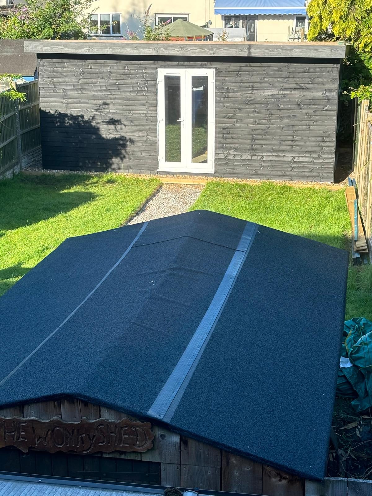 New felt roof being laid on a garden room by Thelwall