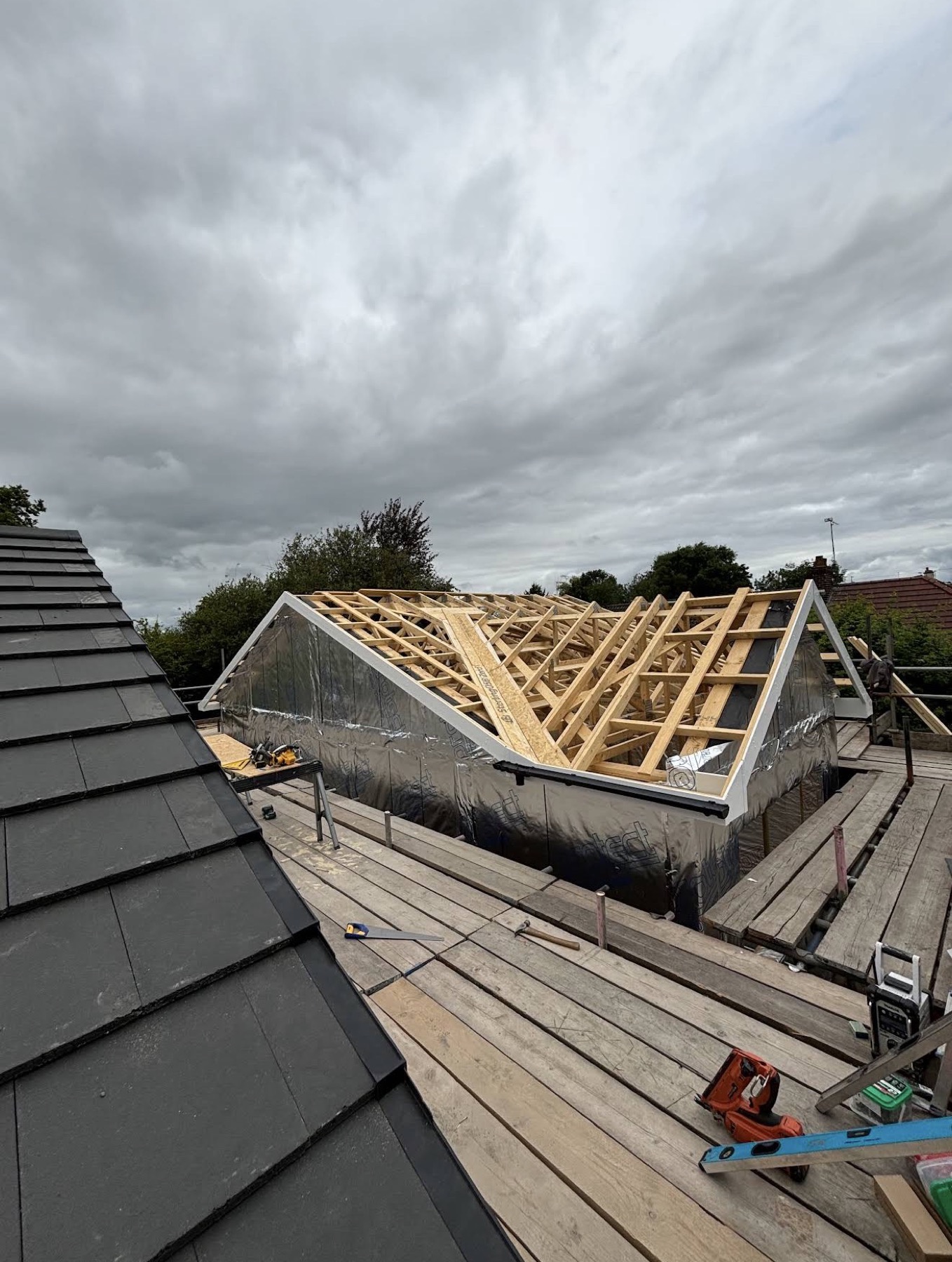 Timber roof framing and structural carpentry in progress